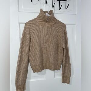 Very warm sweater, with zipper in front, new, only used once.
